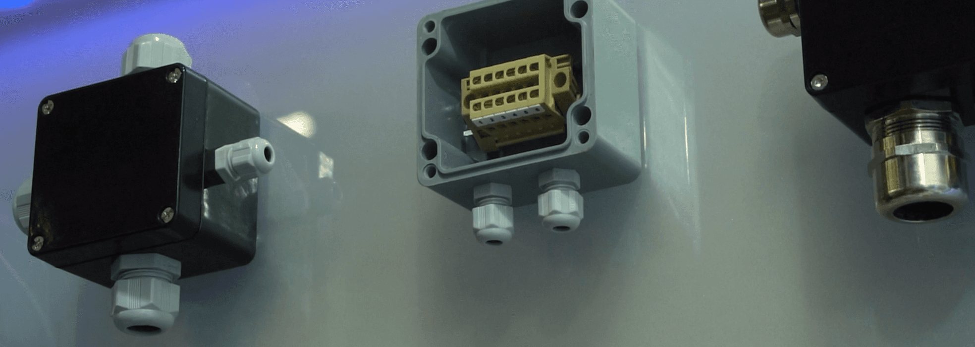 Populated XINDUX industrial enclosures with cable glands